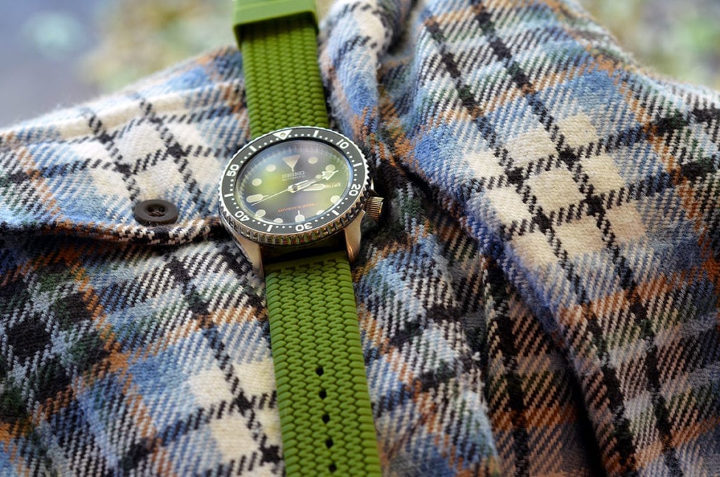A rubber watch band works best with casual shirts.