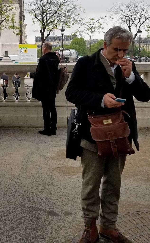 dress in dark hues in Paris