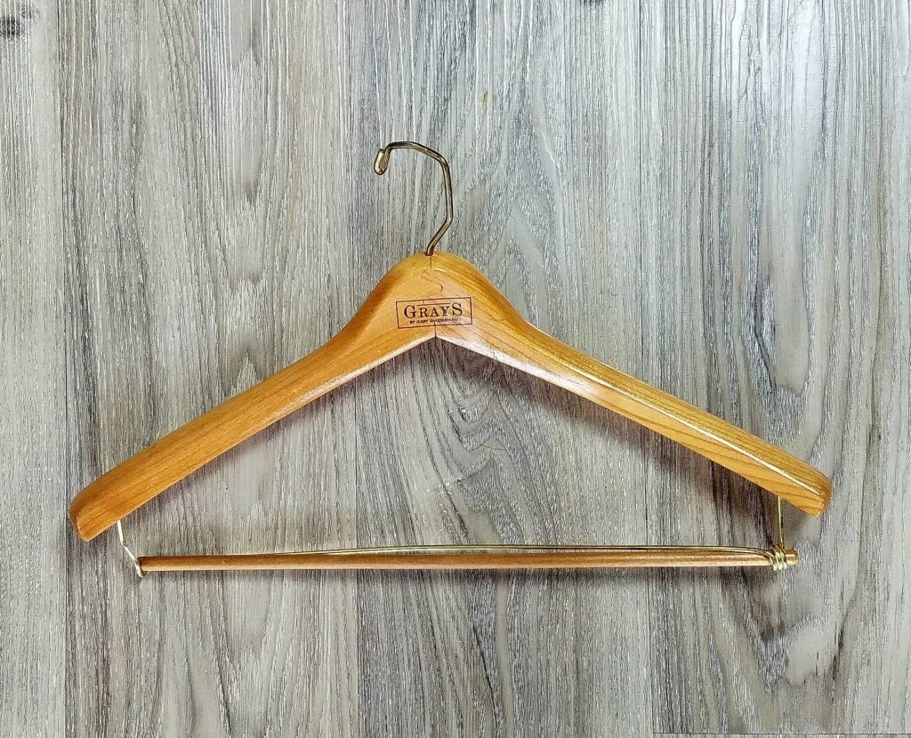How to take care of your suit with a wooden suit hanger