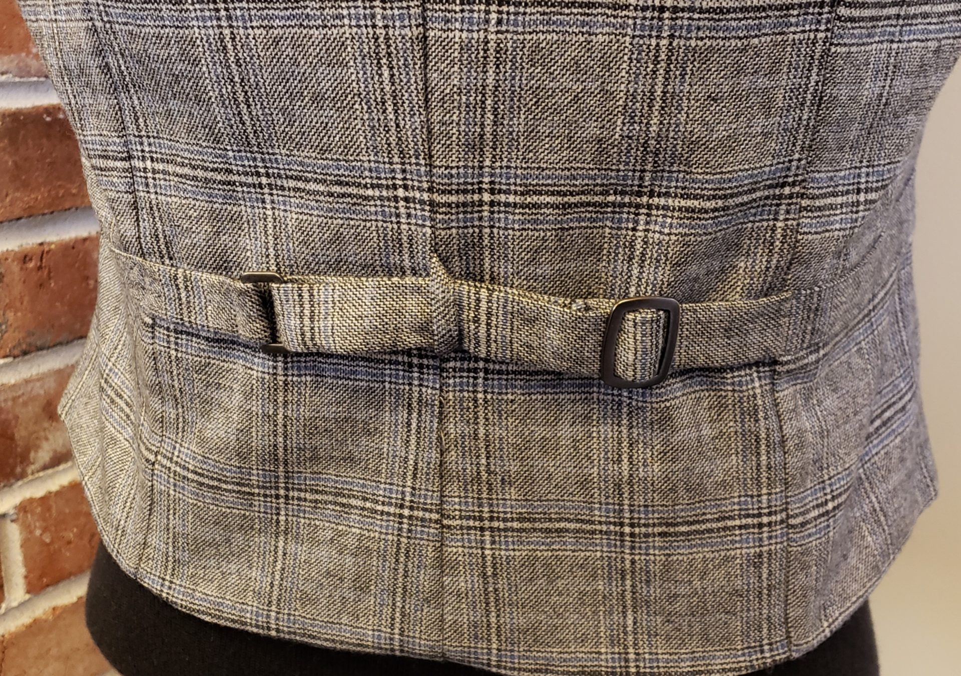 A vest with an adjustable strap
