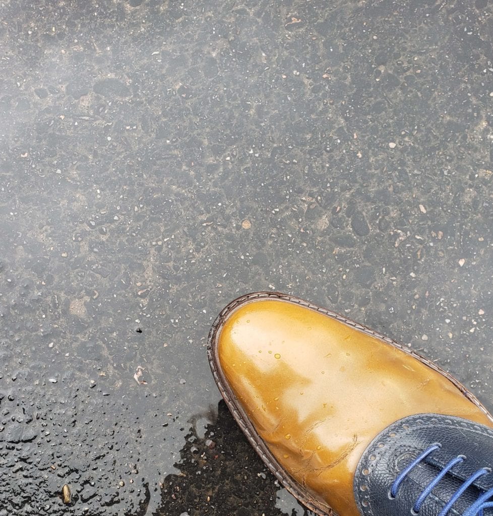 How to protect your dress shoes from the rain involves a good shine