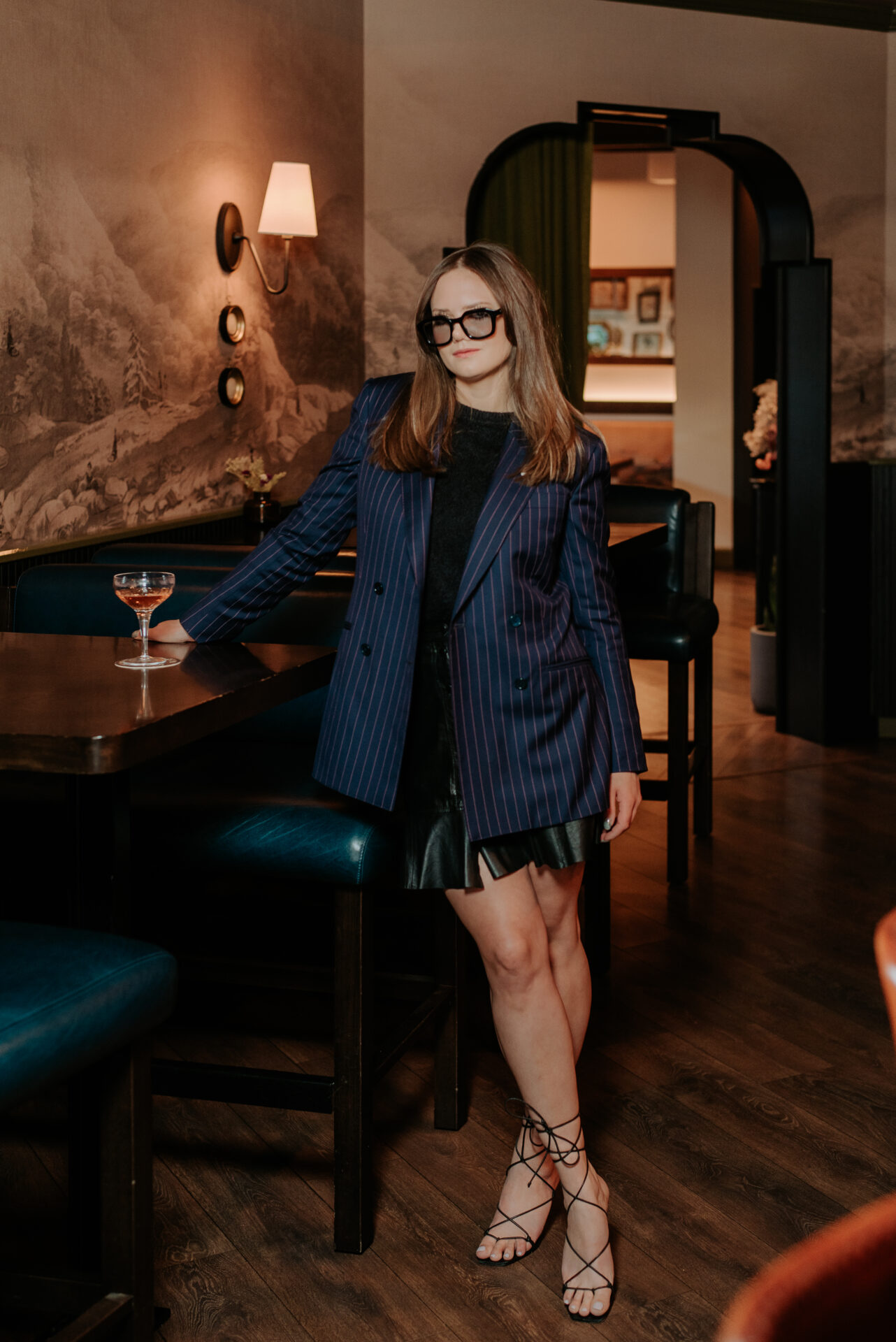 Woman with pinstripe blazer