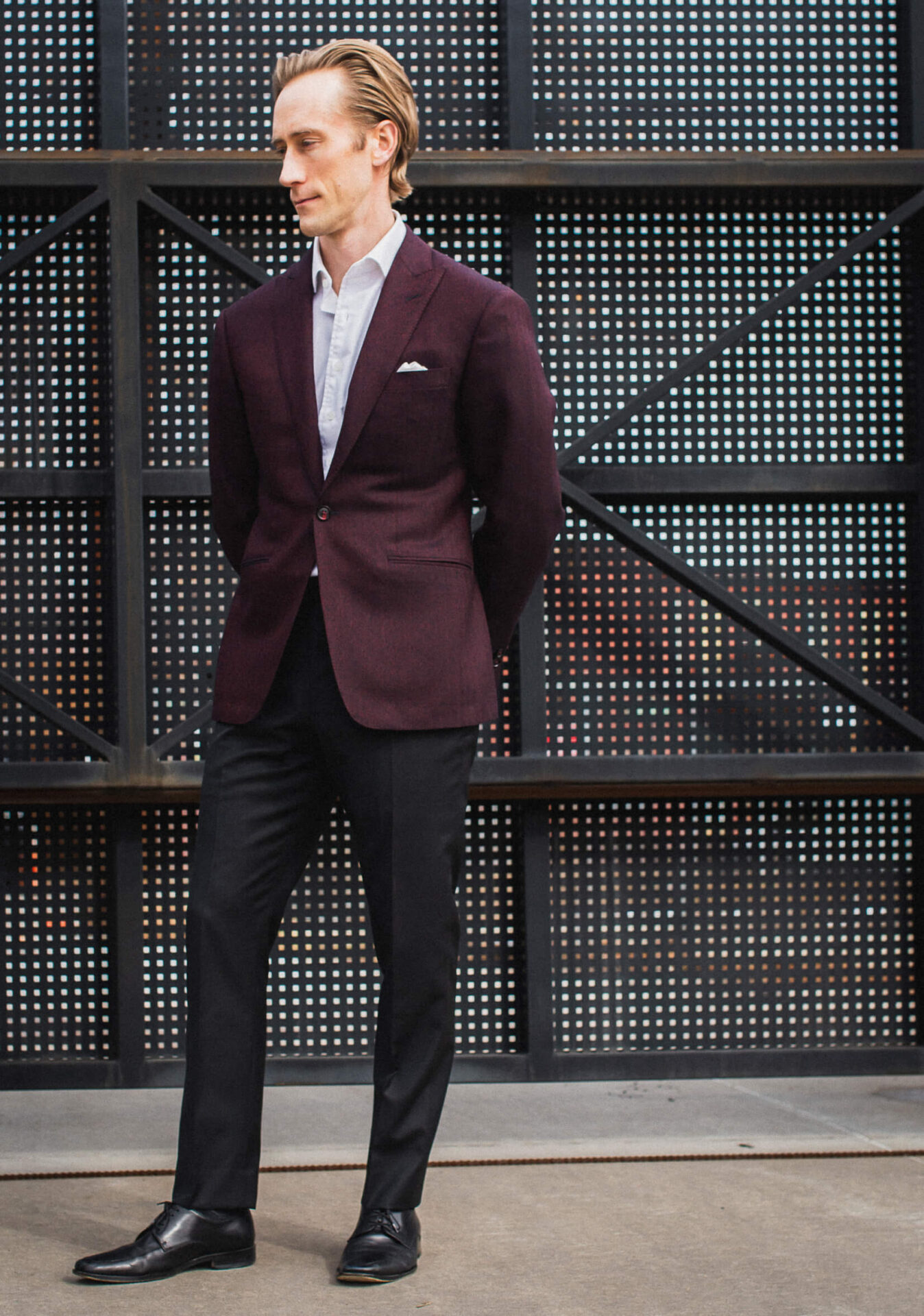 Textured burgundy blazer with black pants